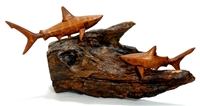 TWO HAND CARVED WOOD SHARKS ON DRIFTWOOD BASE